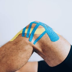 Knie mit Kinesiotape - Leistungen 